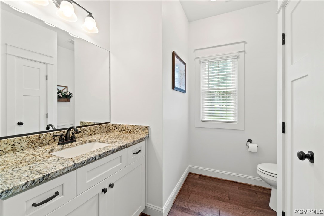 1110 Dorset Road Moseley, VA 23120 - Photo 12 of 32 a bathroom with a granite countertop sink toilet and shower
