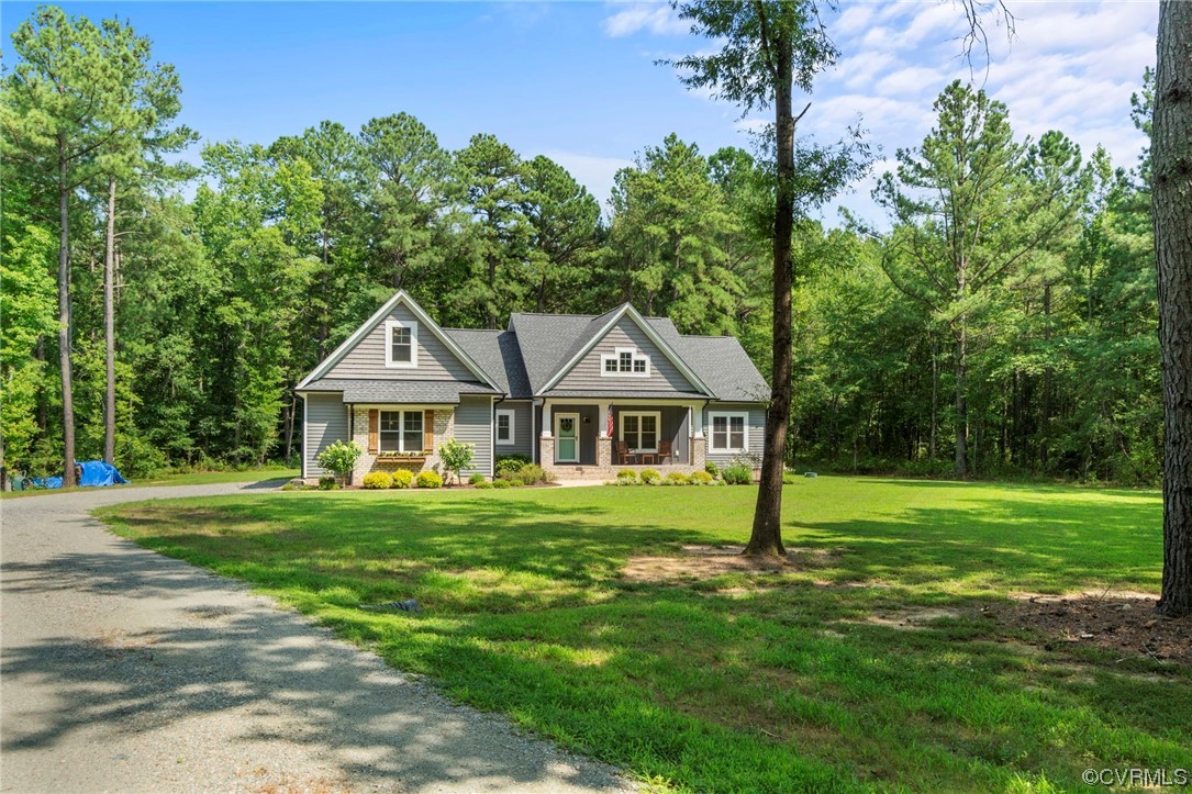 1110 Dorset Road Moseley, VA 23120 - Photo 2 of 32 a front view of a house with a yard
