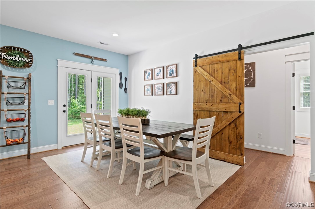 1110 Dorset Road Moseley, VA 23120 - Photo 21 of 32 a dining room with furniture and wooden floor