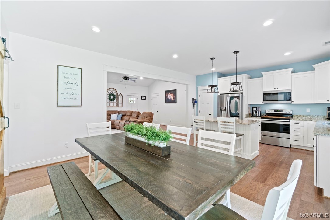 1110 Dorset Road Moseley, VA 23120 - Photo 24 of 32 a living room with stainless steel appliances furniture a rug and a kitchen view