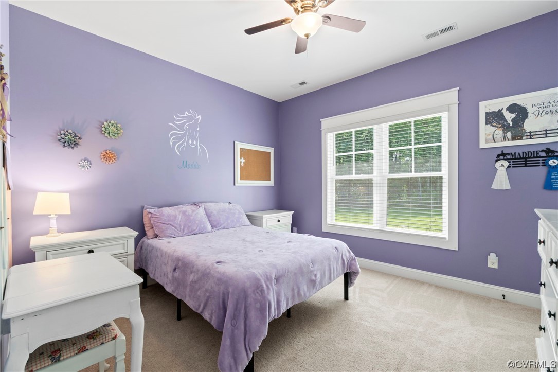1110 Dorset Road Moseley, VA 23120 - Photo 29 of 32 a bedroom with a bed and a window