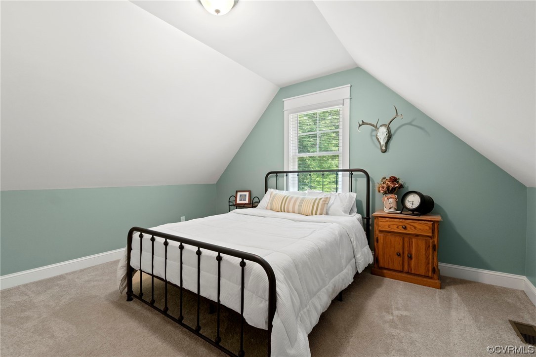 1110 Dorset Road Moseley, VA 23120 - Photo 10 of 32 a bedroom with a bed and a window