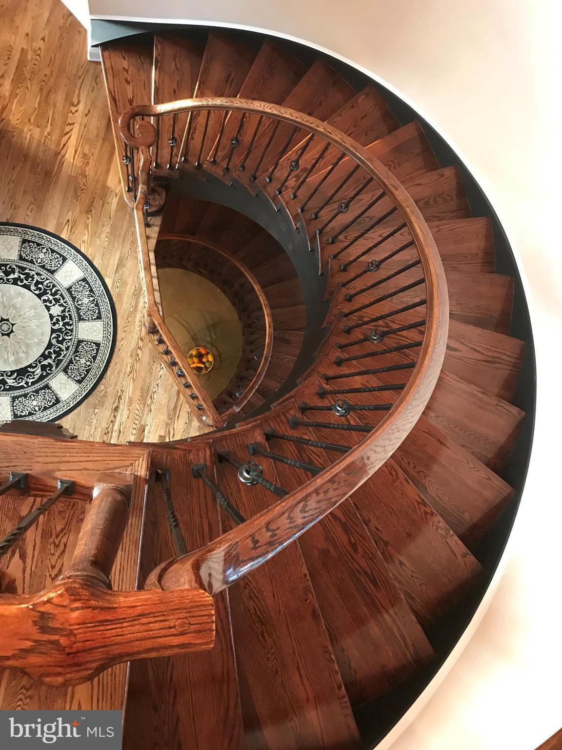2620 Love Point Road Stevensville, MD 21666 - Photo 18 of 30 Custom 2-Story Spiral Hardwood Staircase