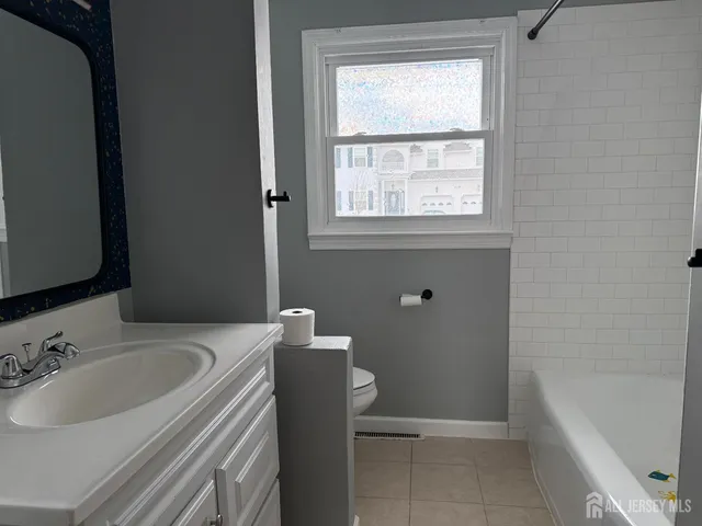 a bathroom with a sink and a bathtub