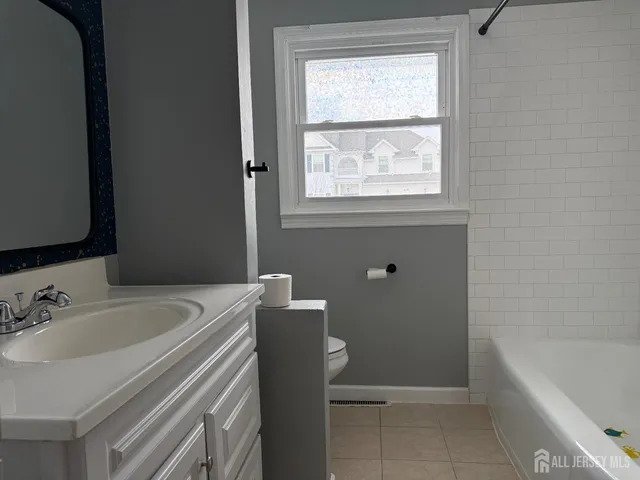 a bathroom with a sink and a bathtub