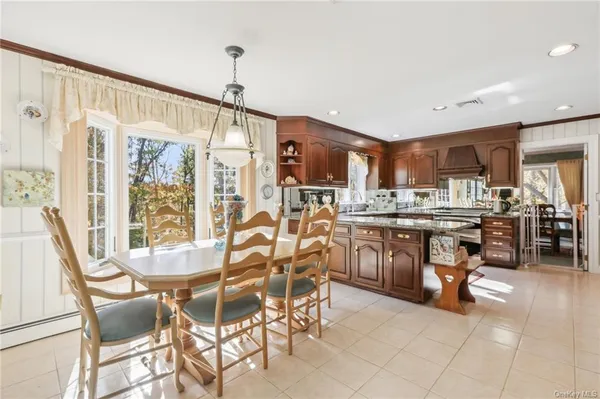 a view of a dining room kitchen and a window