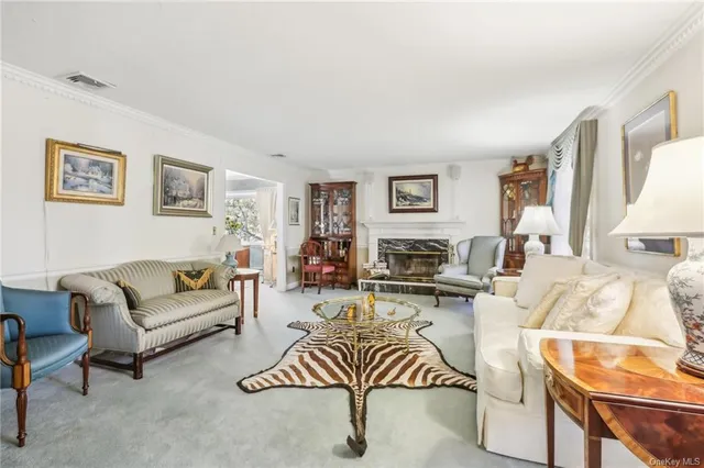 a living room with furniture and a couch