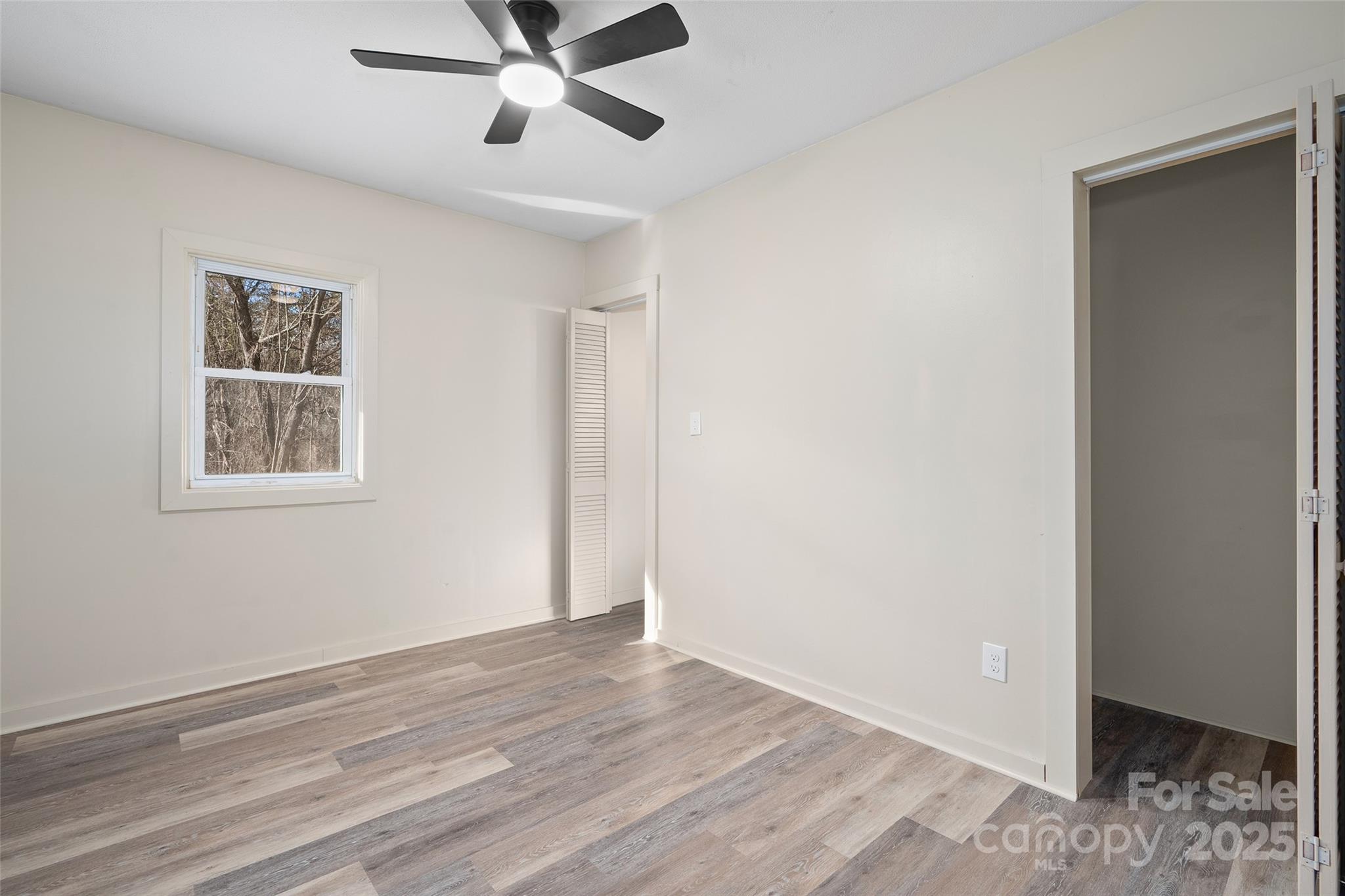 1901 Murray Road Canton, NC 28716 - Photo 13 of 21 a view of a room with wooden floor and closet
