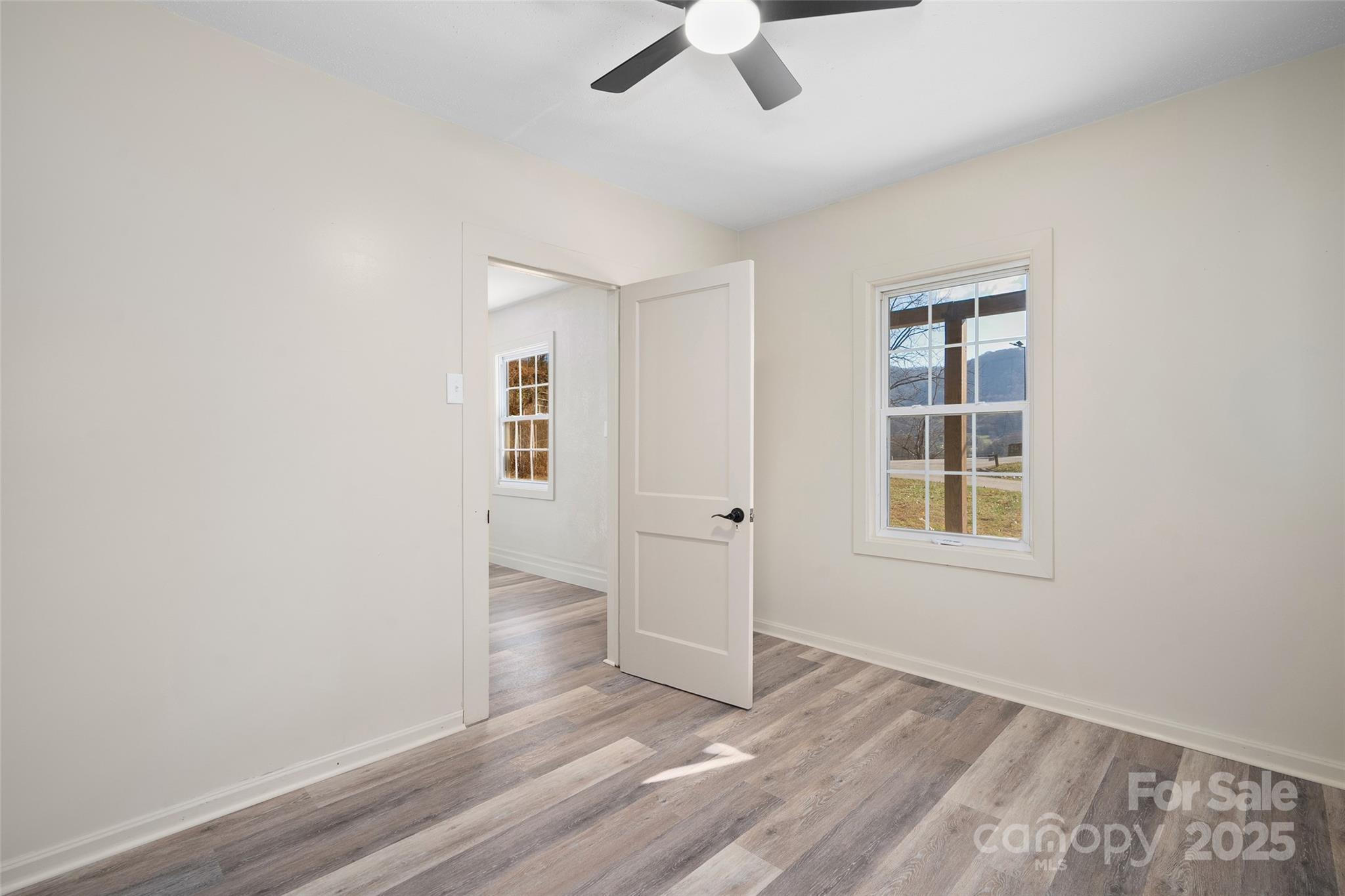 1901 Murray Road Canton, NC 28716 - Photo 14 of 21 an empty room with a empty space and windows