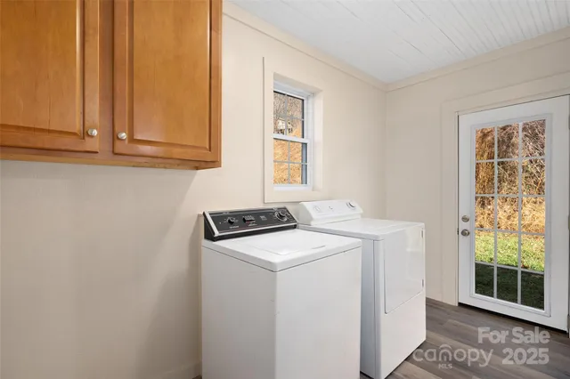 a utility room with dryer and washer