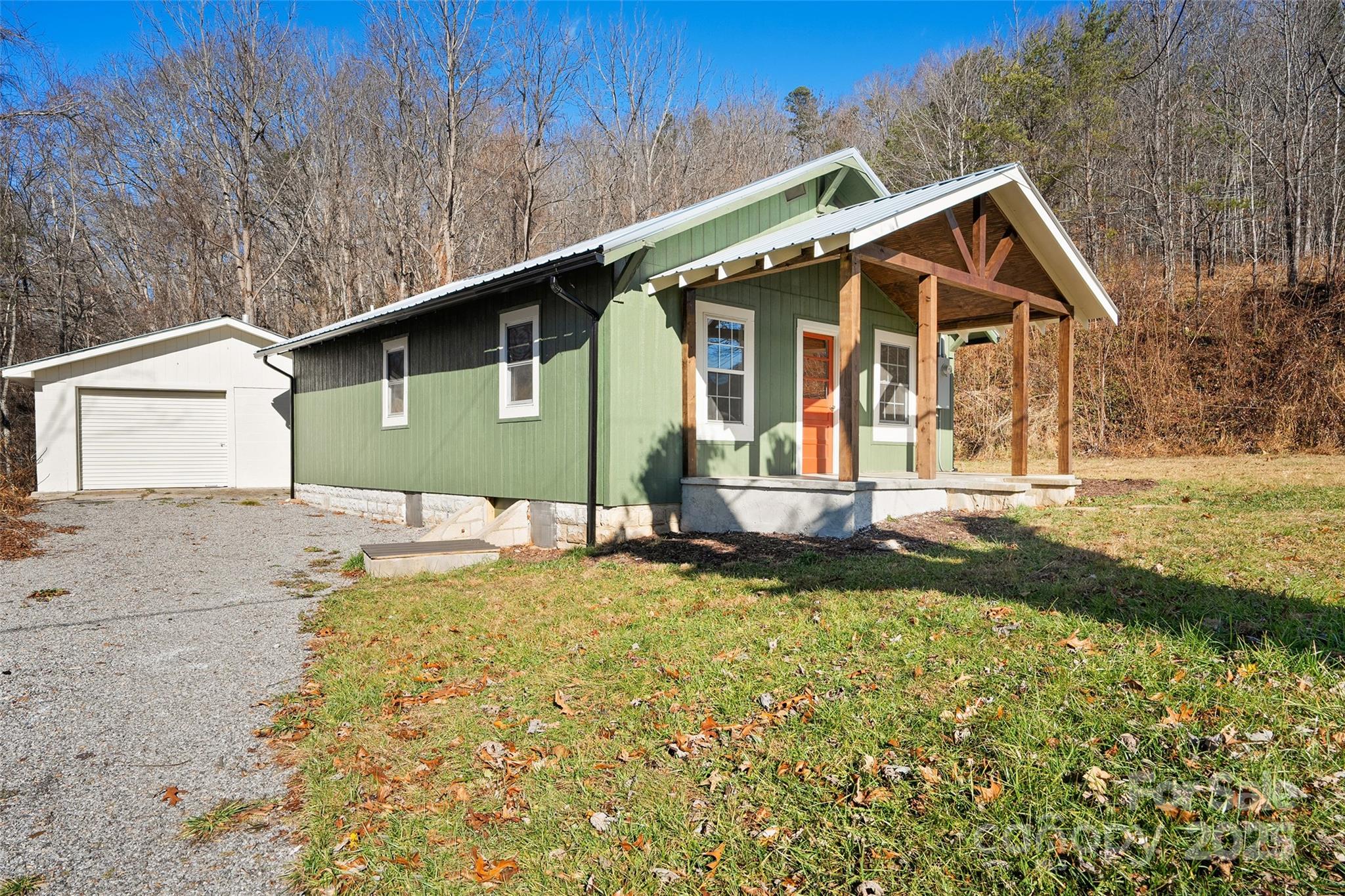 1901 Murray Road Canton, NC 28716 - Photo 3 of 21 a front view of a house with a yard