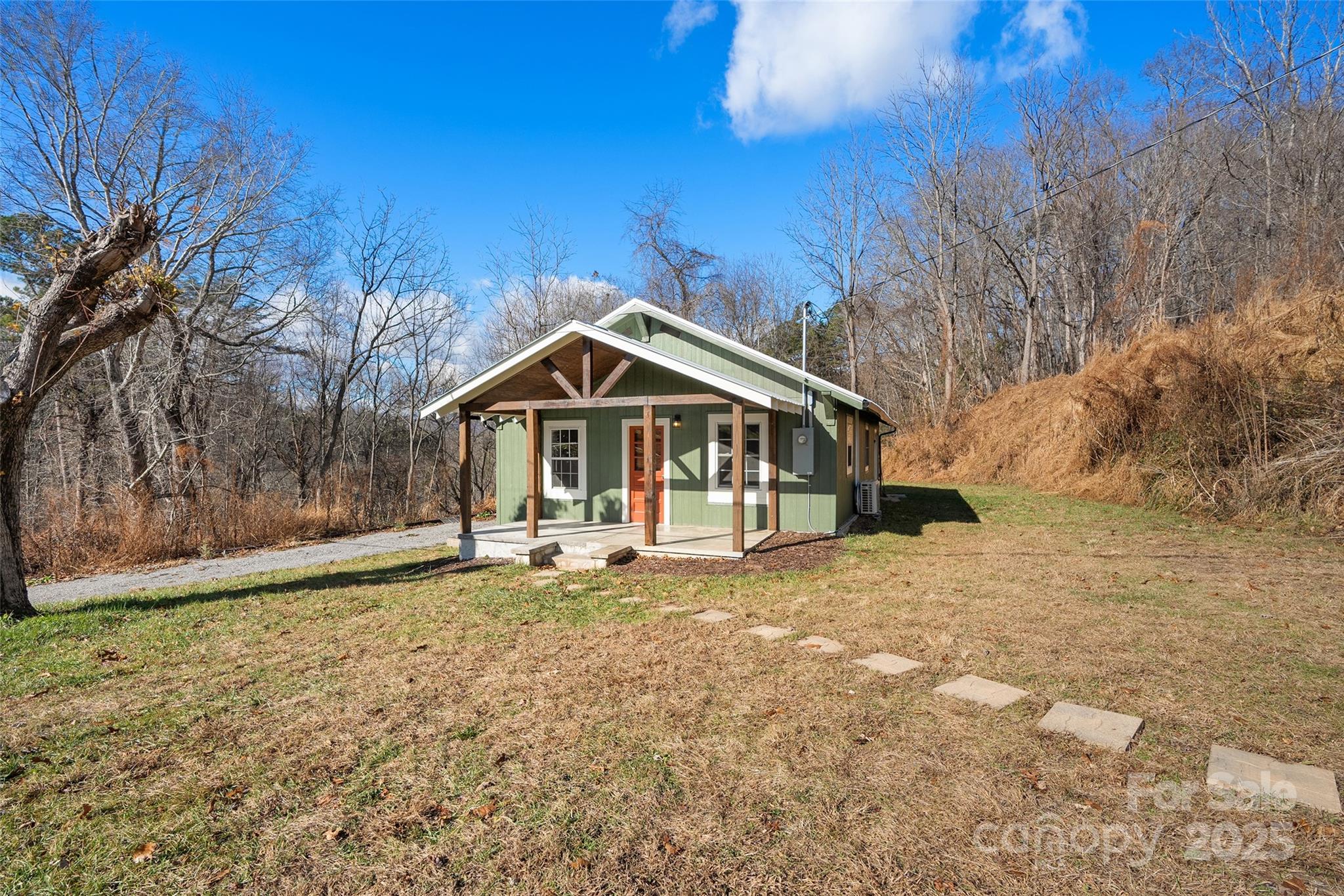 1901 Murray Road Canton, NC 28716 - Photo 4 of 21 a front view of house with yard and trees in the background