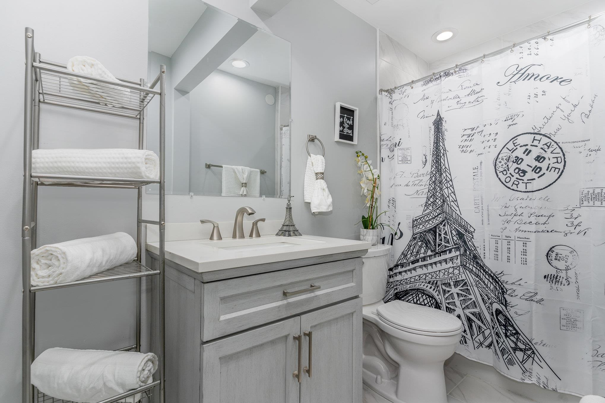 327 2nd Street Spring Hope, NC 27882 - Photo 13 of 20 a bathroom with a toilet sink vanity granite and shower