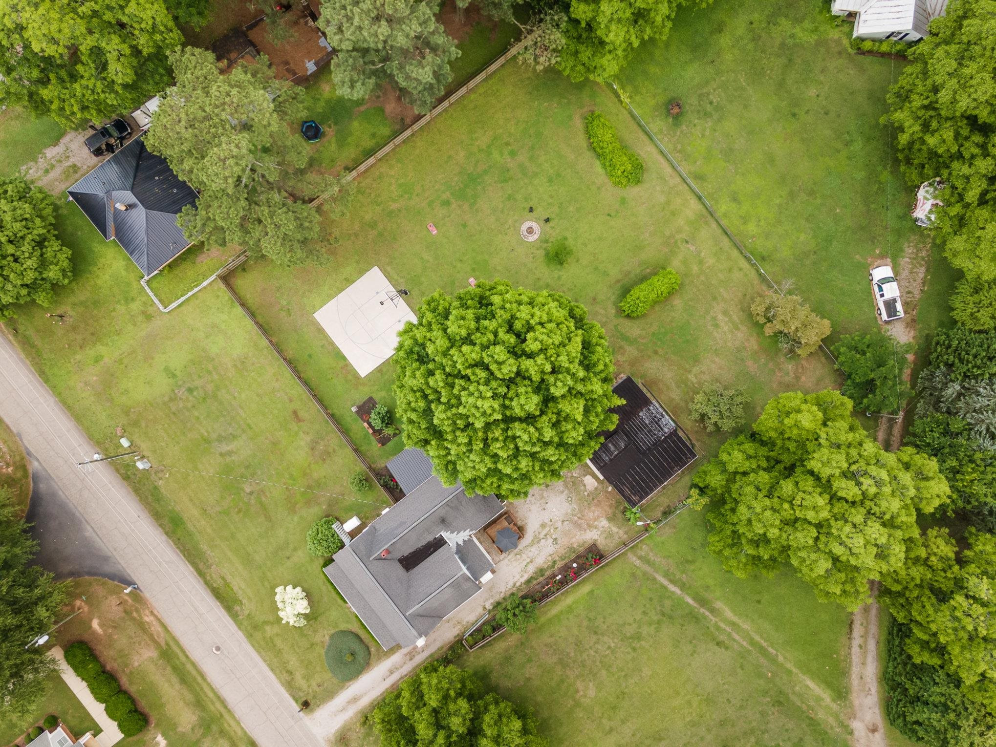 327 2nd Street Spring Hope, NC 27882 - Photo 4 of 20 an aerial view of a residential houses with yard