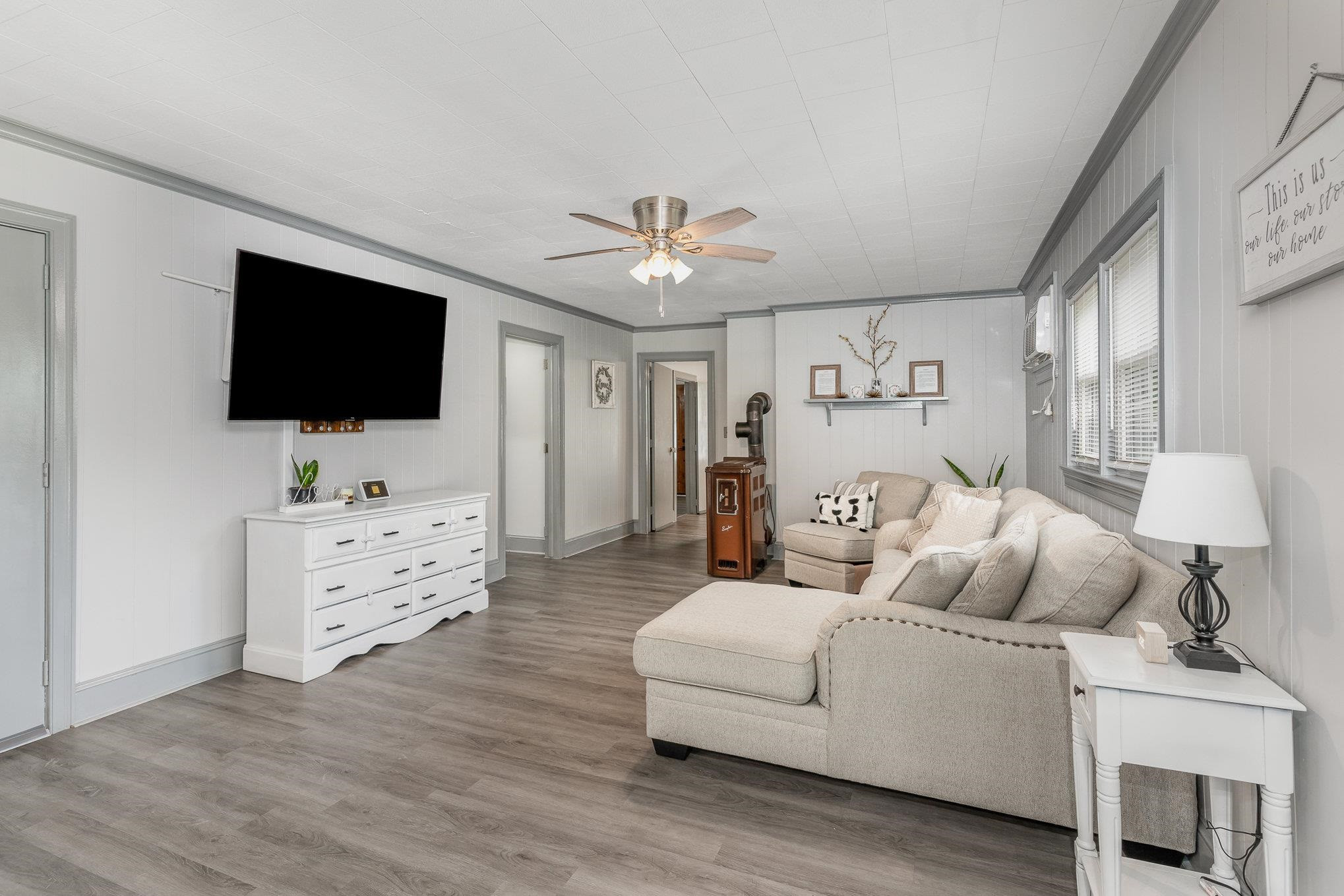 327 2nd Street Spring Hope, NC 27882 - Photo 5 of 20 a living room with furniture and a flat screen tv
