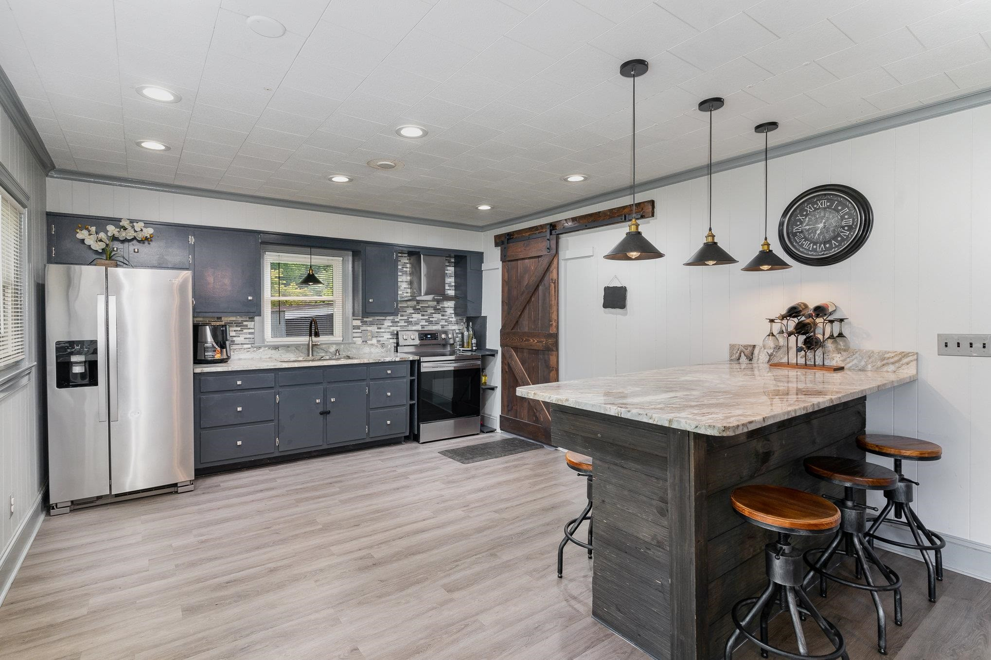 327 2nd Street Spring Hope, NC 27882 - Photo 7 of 20 a kitchen with a table and chairs in it