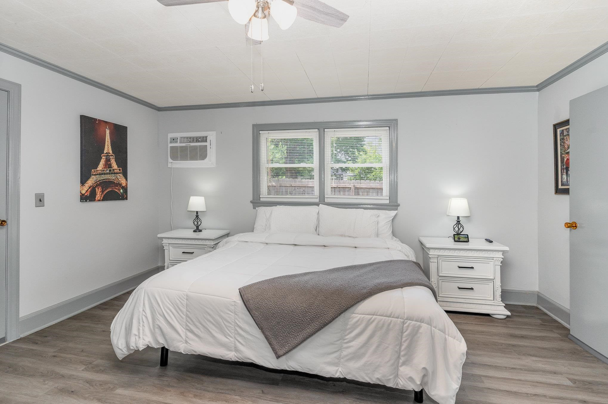 327 2nd Street Spring Hope, NC 27882 - Photo 9 of 20 a bedroom with a bed and a lamp