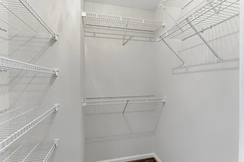 a view of a room with racks on the wall
