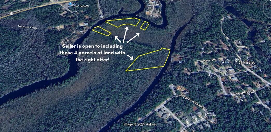 1 Alaqua Cove Road Freeport, FL 32439 - Photo 4 of 7 a picture of street sign