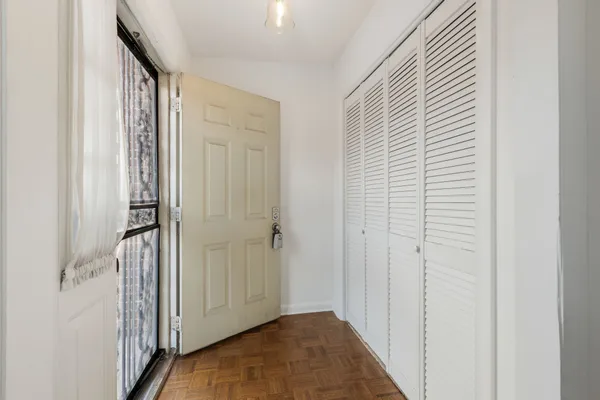 a view of a livingroom from a hallway