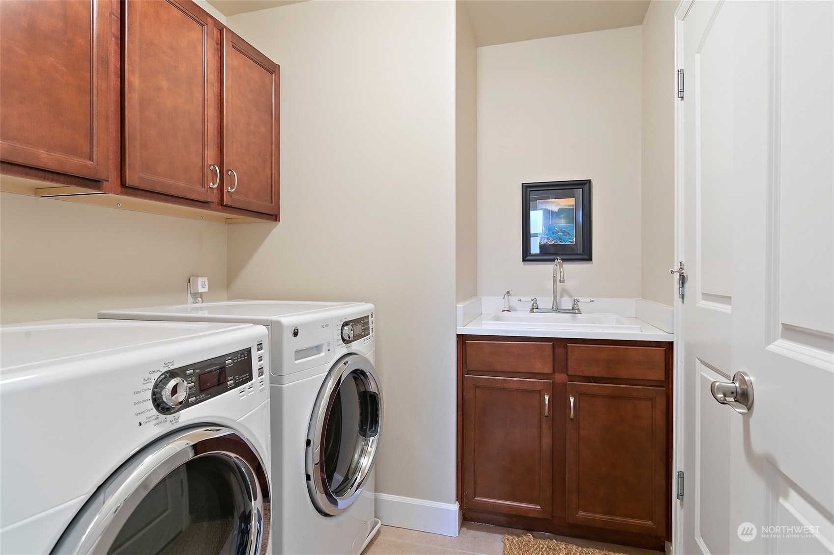 17821 Southeast 134th Street Renton, WA 98059 - Photo 13 of 33 a utility room with dryer and washer