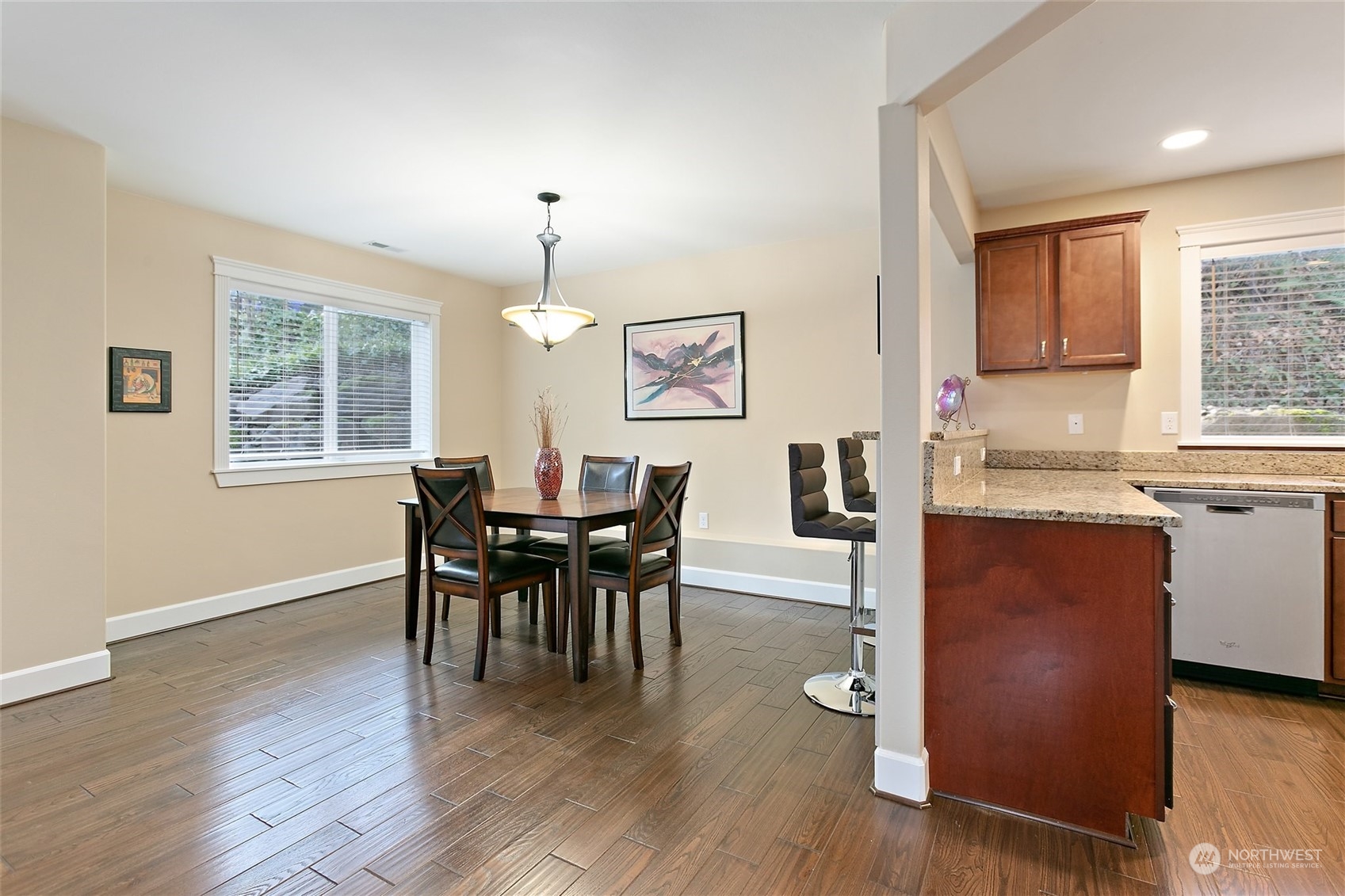 17821 Southeast 134th Street Renton, WA 98059 - Photo 8 of 33 a view of a dining room with furniture window and wooden floor