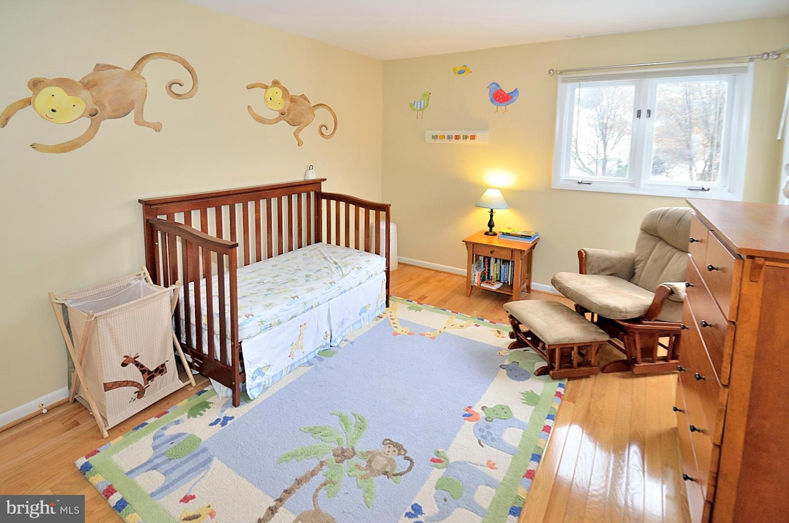 1283 Wedgewood Manor Way Reston, VA 20194 - Photo 17 of 27 a bedroom with furniture and a window