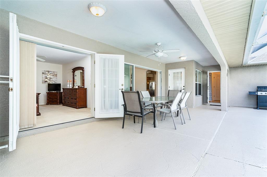 70 Tournament Road Rotonda West, FL 33947 - Photo 19 of 47 a dining room with furniture and wooden floor