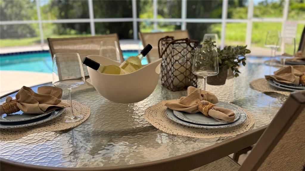 70 Tournament Road Rotonda West, FL 33947 - Photo 20 of 47 a room with furniture and a wooden floor