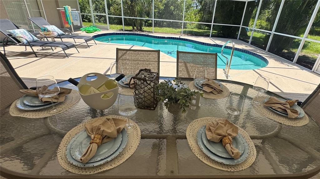 70 Tournament Road Rotonda West, FL 33947 - Photo 21 of 47 a bird view of livingroom with furniture