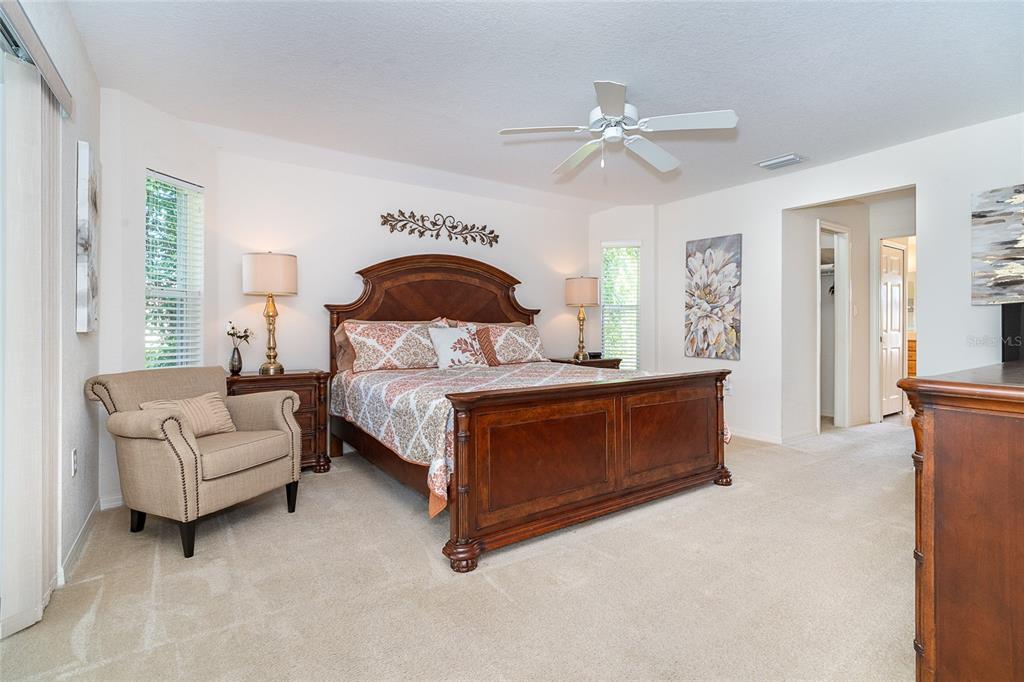 70 Tournament Road Rotonda West, FL 33947 - Photo 28 of 47 a bed room with a bed and a couch