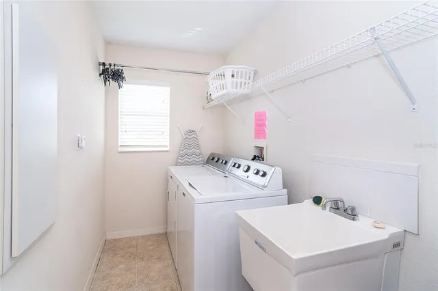a view of a garage with a table and a chairs