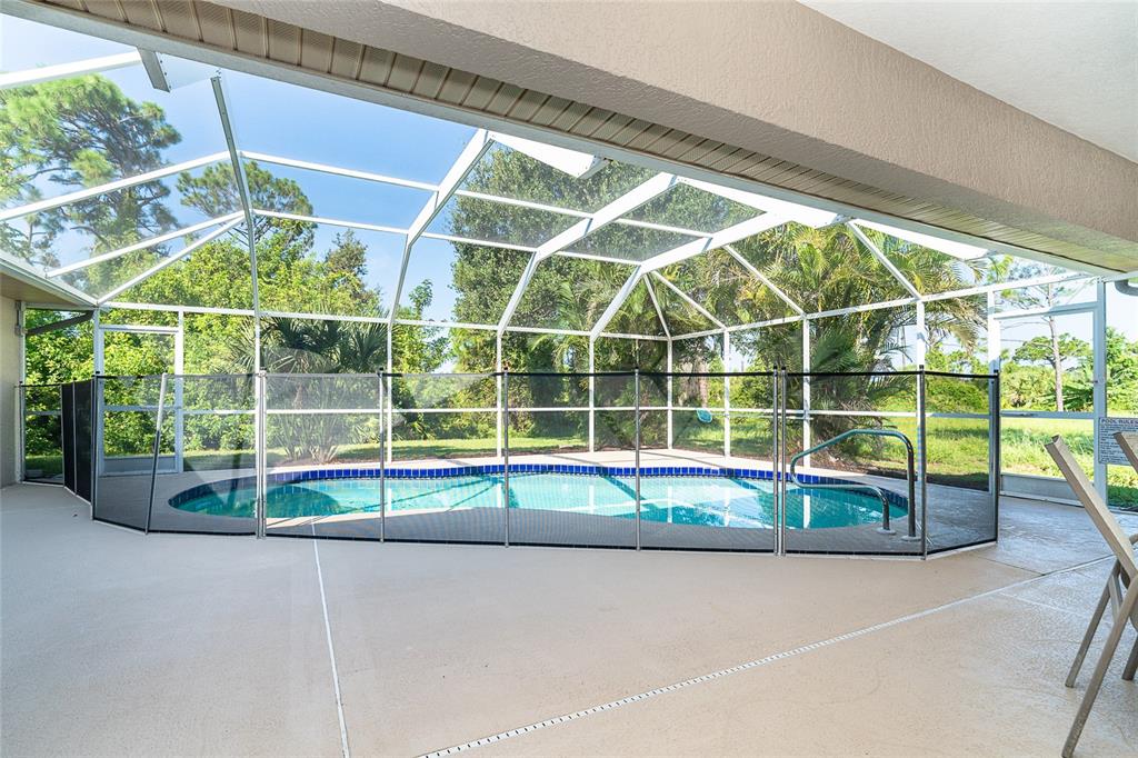 70 Tournament Road Rotonda West, FL 33947 - Photo 46 of 47 a view of outdoor space with swimming pool