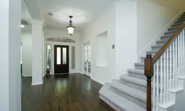 a front view of a room with gym equipment
