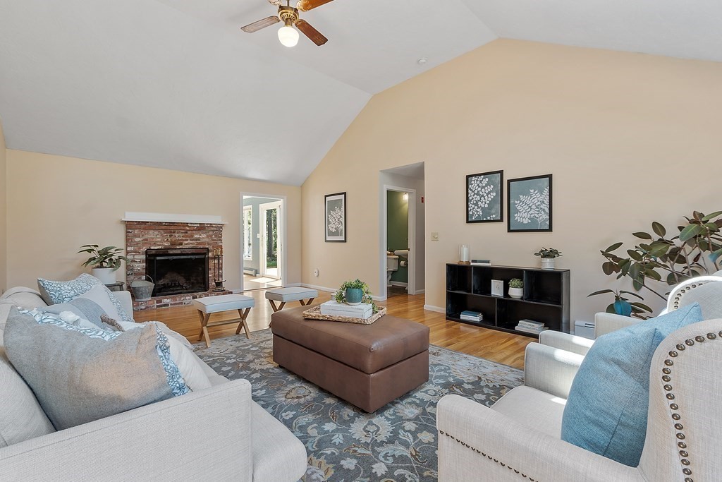5 Thicket Circle Stow, MA 01775 - Photo 16 of 37 a living room with furniture and a fireplace