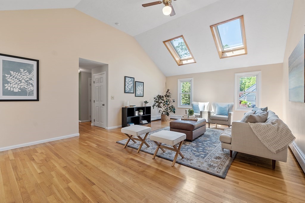 5 Thicket Circle Stow, MA 01775 - Photo 18 of 37 a living room with furniture and a fireplace