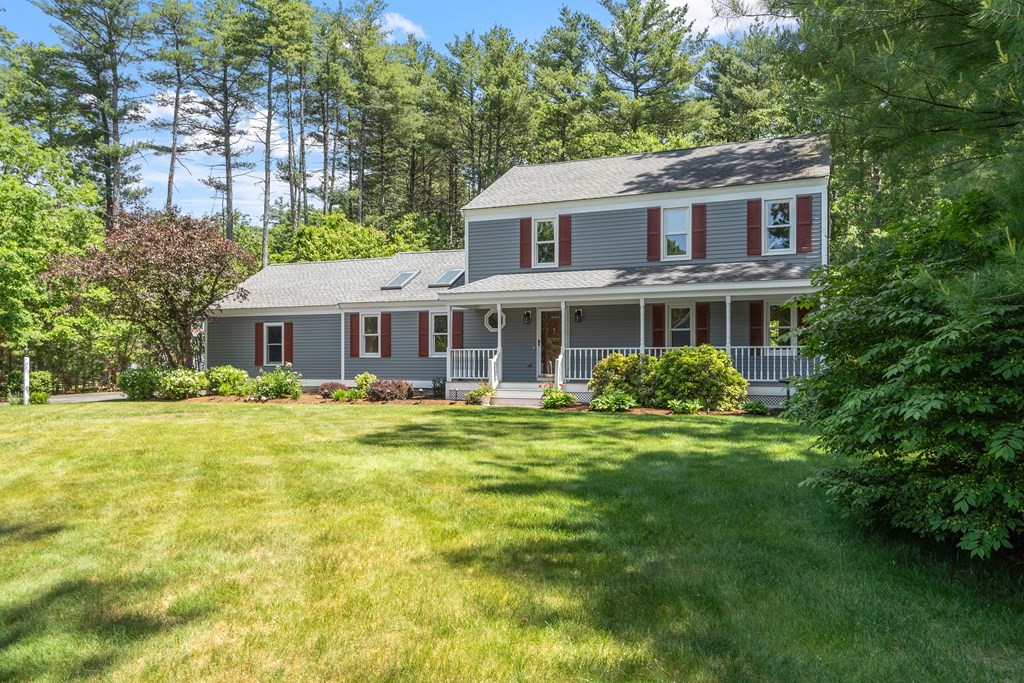 5 Thicket Circle Stow, MA 01775 - Photo 2 of 37 a front view of house with yard and green space