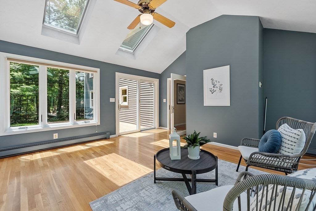 5 Thicket Circle Stow, MA 01775 - Photo 22 of 37 a living room with furniture and a large window