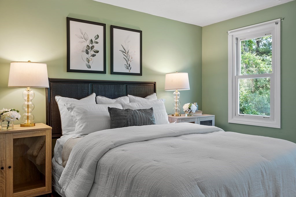 5 Thicket Circle Stow, MA 01775 - Photo 24 of 37 a bedroom with bed and painting on the wall