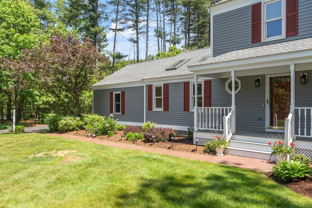 5 Thicket Circle Stow, MA 01775 - Photo 3 of 37 a front view of a house with garden
