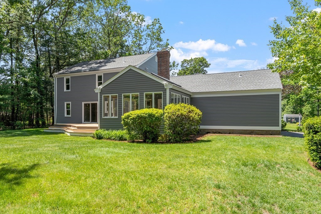 5 Thicket Circle Stow, MA 01775 - Photo 6 of 37 a view of a house with a yard and a large tree