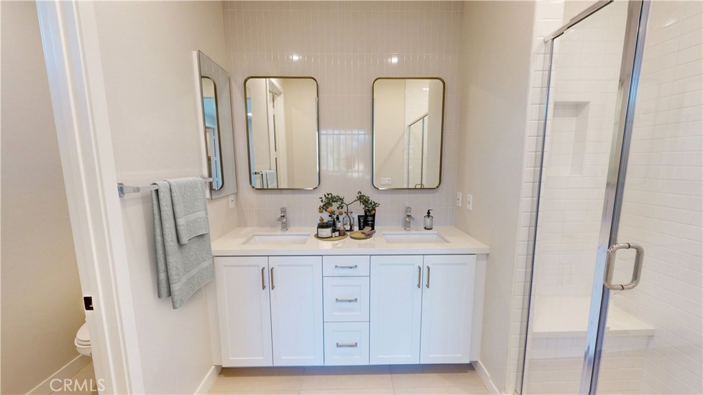 4357 Jasmine Lane Arcadia, CA 91006 - Photo 9 of 12 a bathroom with double vanity sink a mirror and vanity