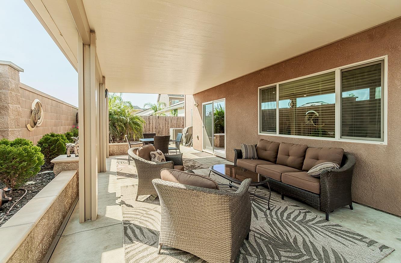 2043 North Soledad Avenue Clovis, CA 93619 - Photo 29 of 33 a living room with furniture and a large window