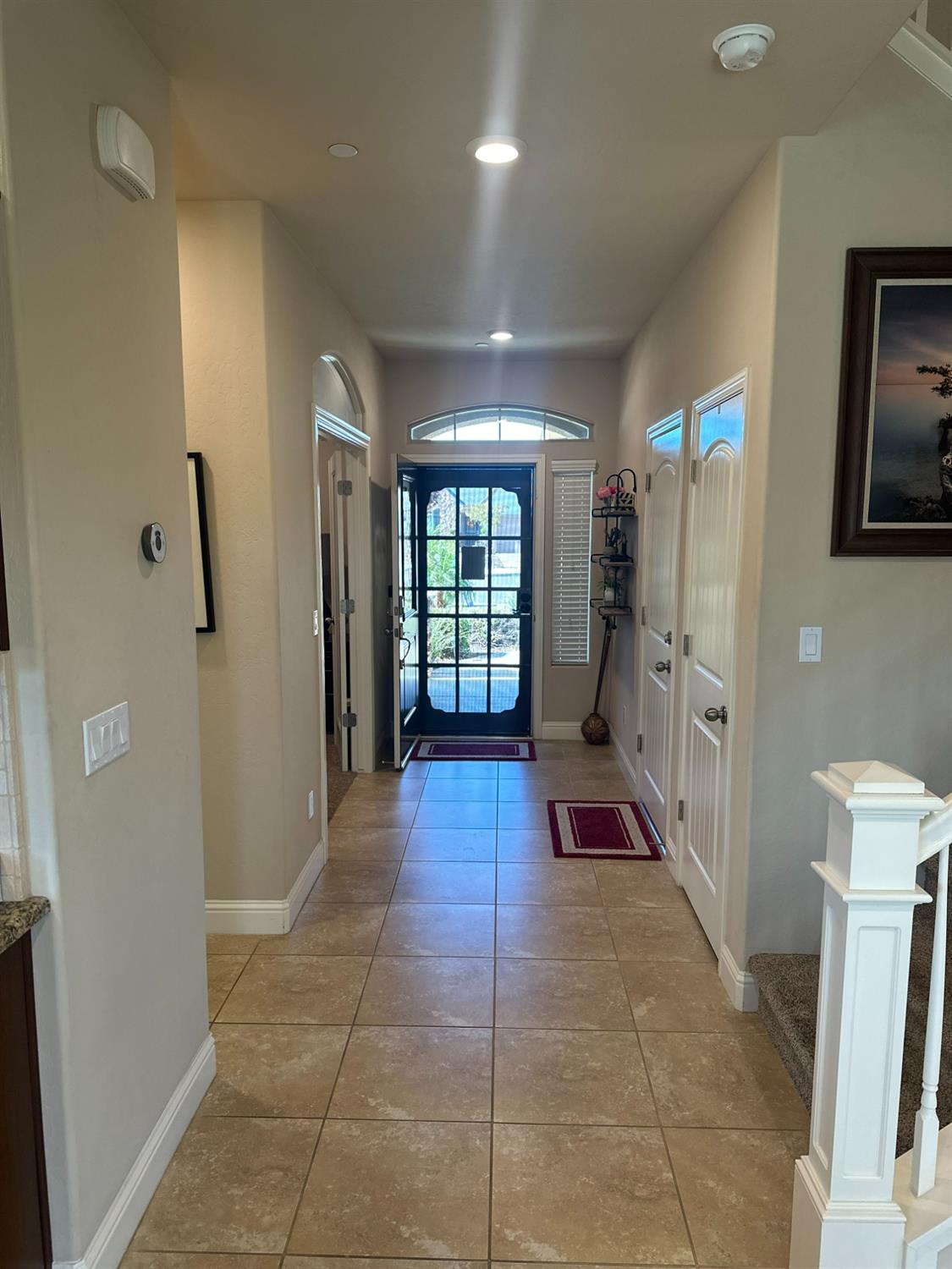2043 North Soledad Avenue Clovis, CA 93619 - Photo 3 of 33 a hallway with windows