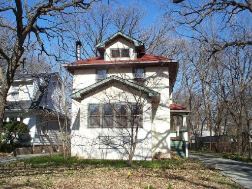 262 Scottswood Road Riverside, IL 60546 - Photo 1 of 1 a view of a wooden house with a large tree