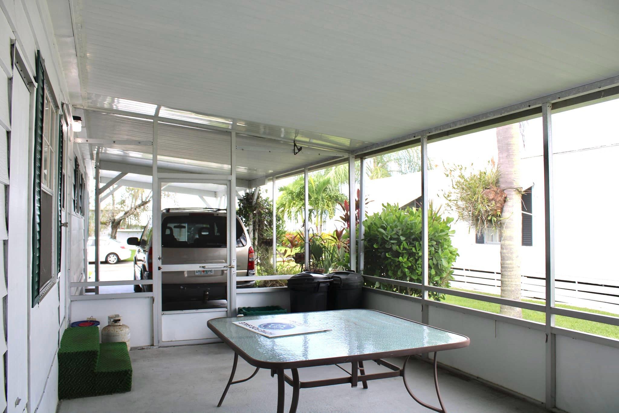 164 Camino Del Rio Port St. Lucie, FL 34952 - Photo 23 of 26 Screened in side porch