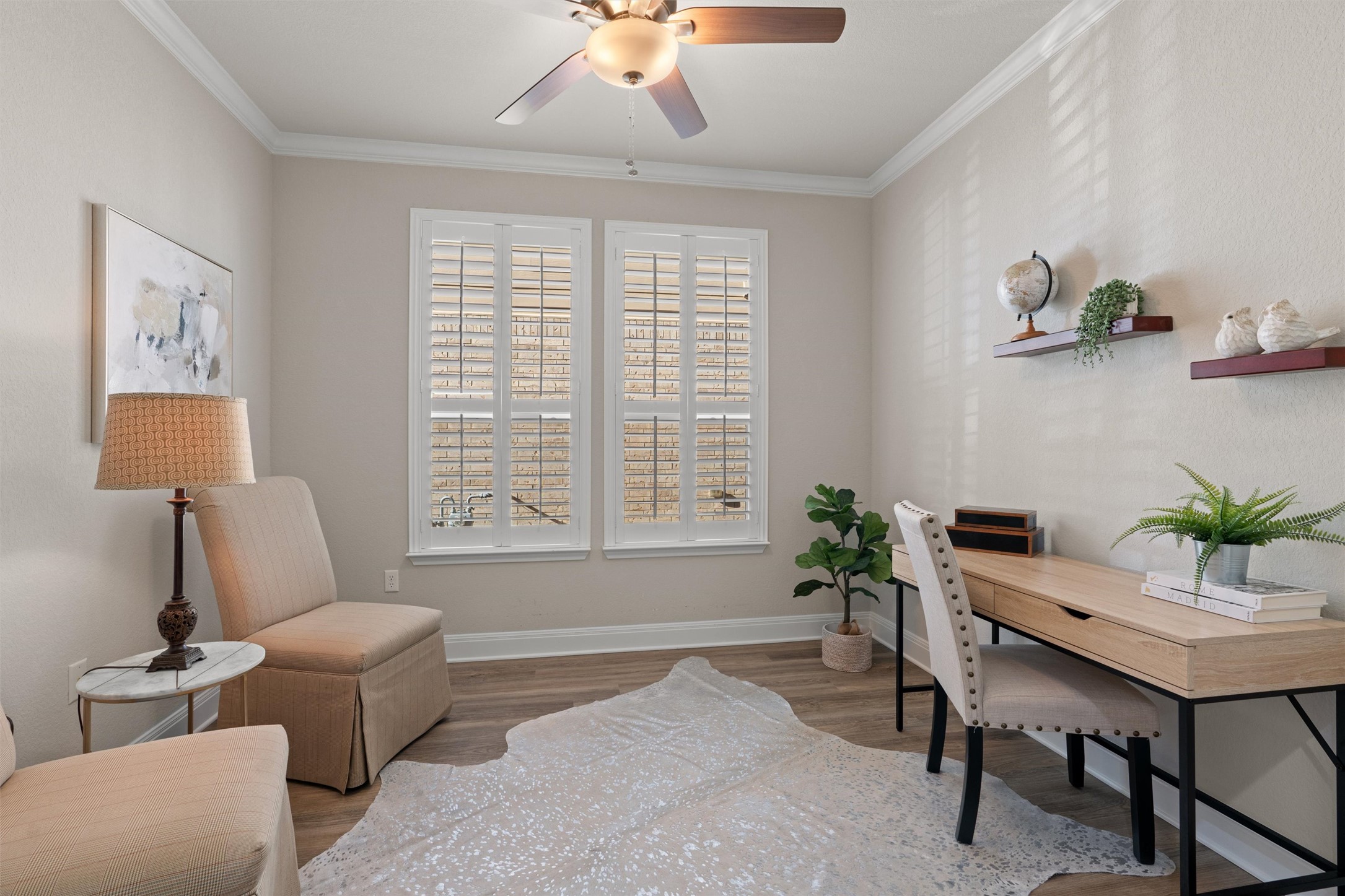 10502 Turnbull Loop, Unit 41 Austin, TX 78717 - Photo 11 of 35 Office space featuring crown molding, ceiling fan, and luxury vinyl plank floors