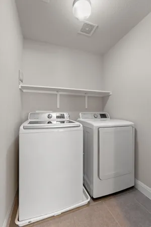 a bathroom with a sink toilet a mirror and shower