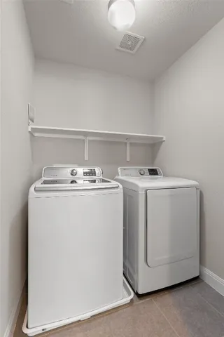 a bathroom with a sink toilet a mirror and shower