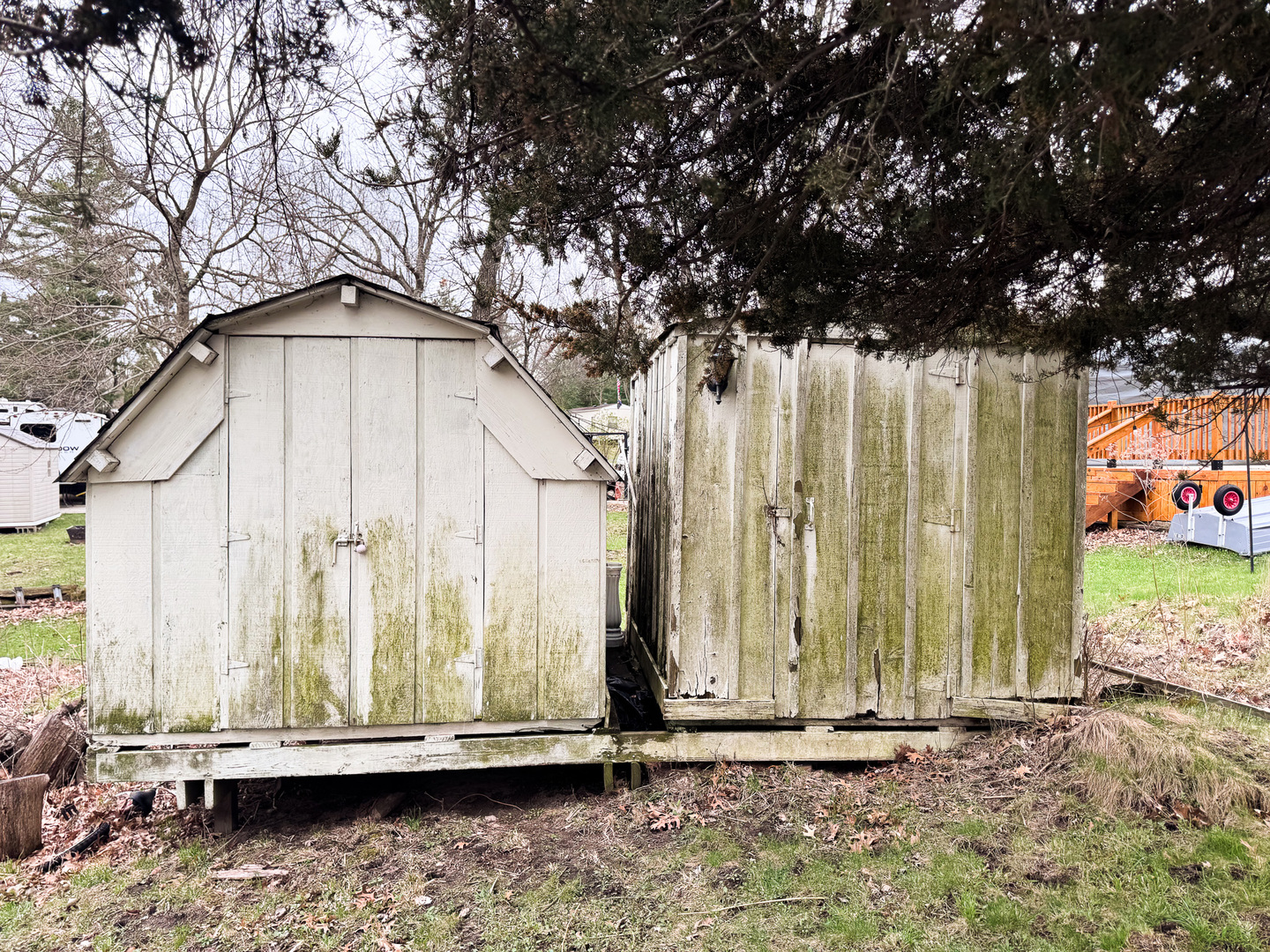 4-86 Woodhaven Sublette, IL 61367 - Photo 4 of 5 a wooden fence with some trees in the background